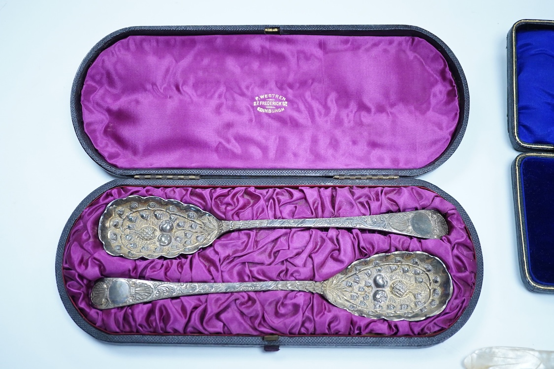 A cased pair of George III engraved silver Old English pattern berry spoons, by Smith & Fearn, London, 1794/5, 22.6cm, together with a cased Edwardian silver christening trio, an 800 standard mustard pot with white metal